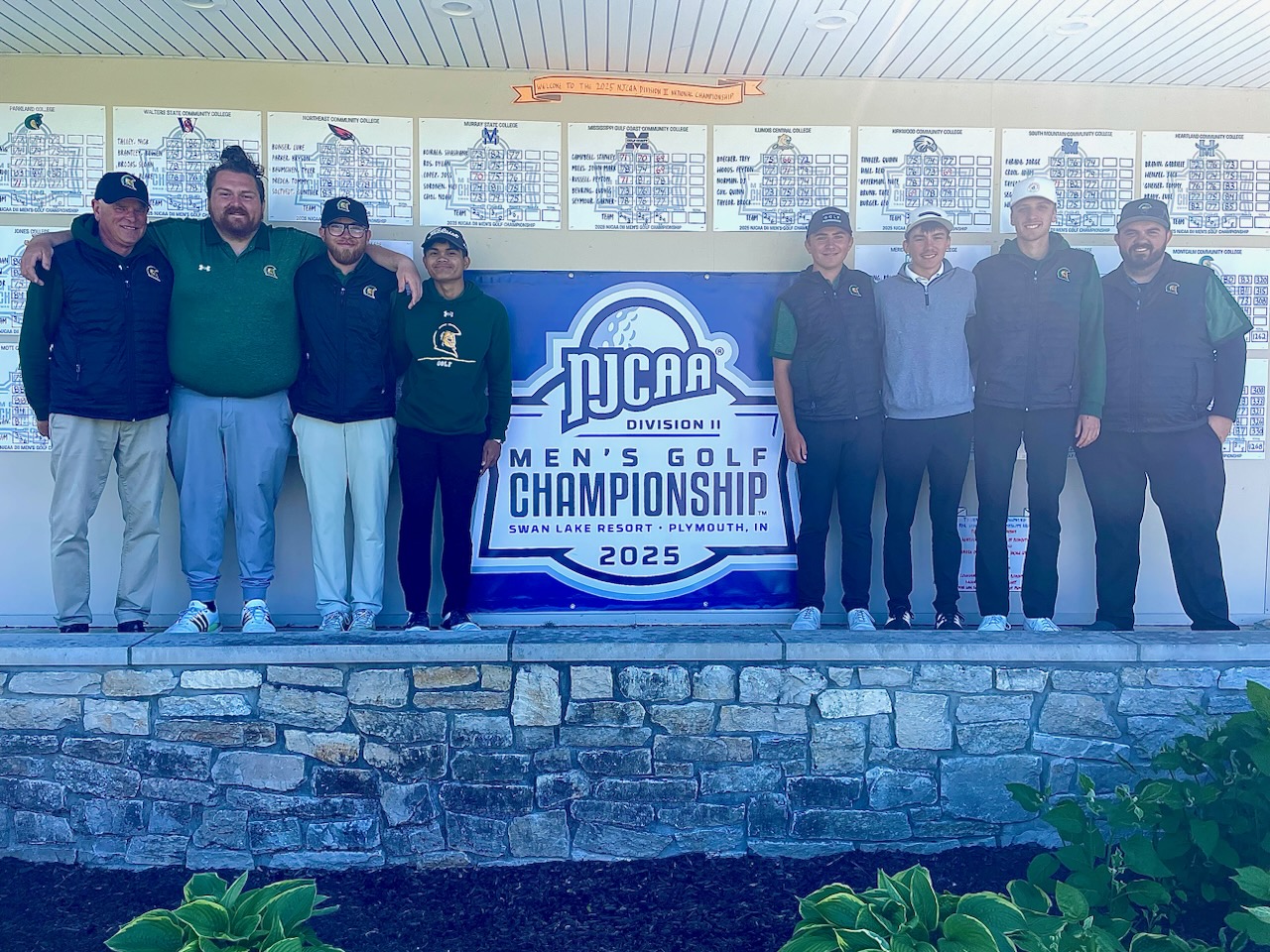 Centurion Men's Golf Team standing next to the NJCAA Division II Men's Golf Championship 2025 sign